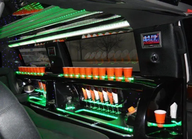 Lincoln MKT Executive Stretch a row of orange cups in a limo