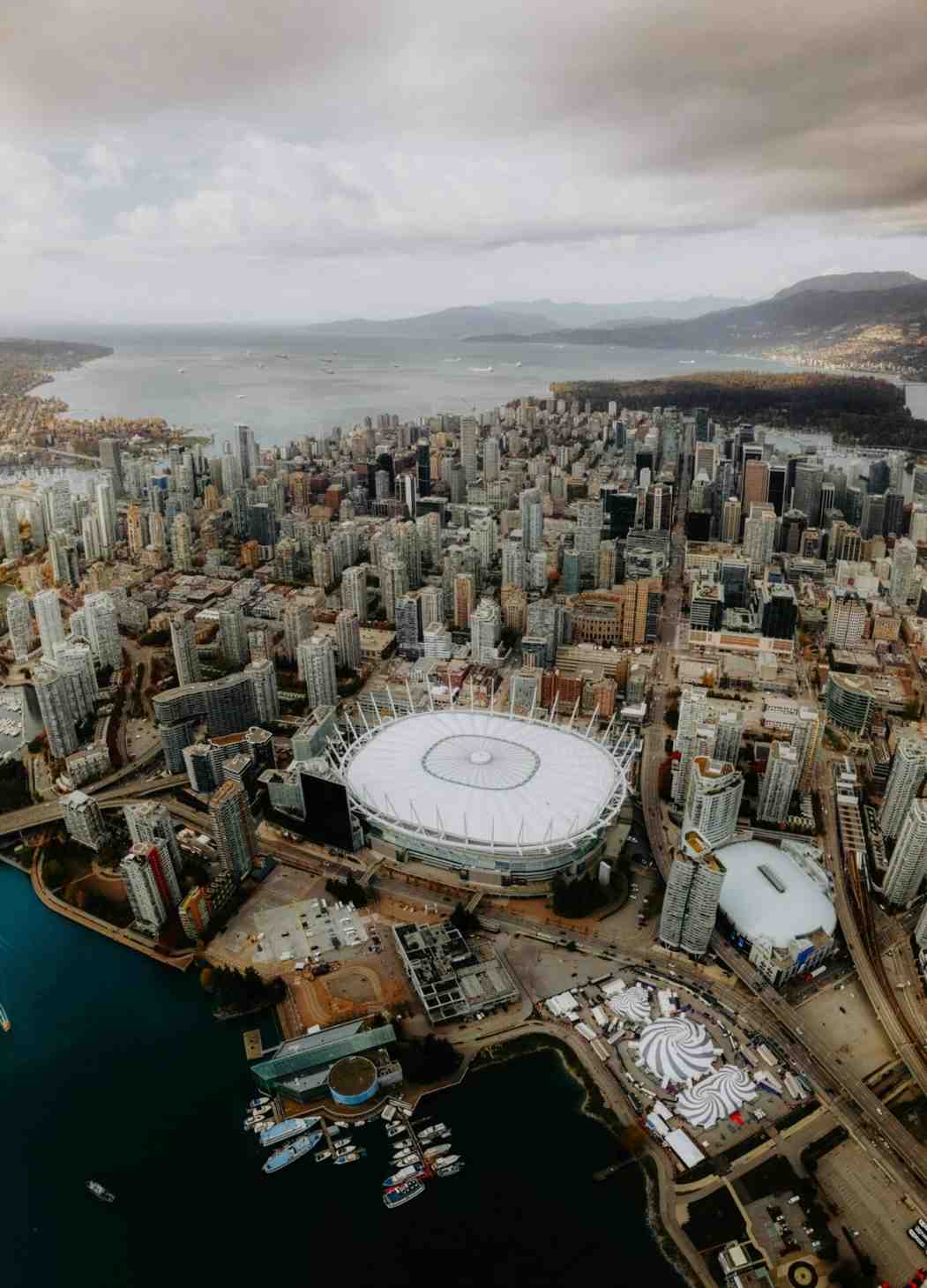 a city with a large white stadium