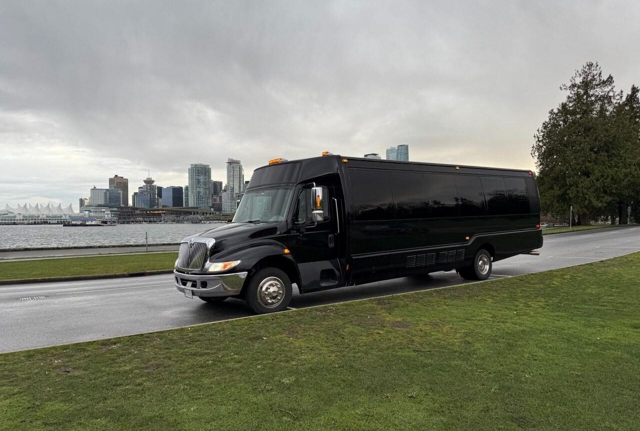 Home Vancouver Airport Limo Transfer showcasing big black party bus