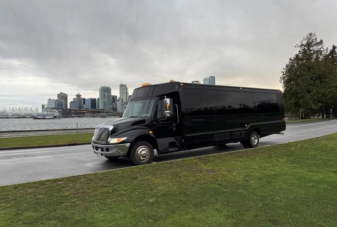 Home Vancouver Airport Limo Service showcasing big black party bus